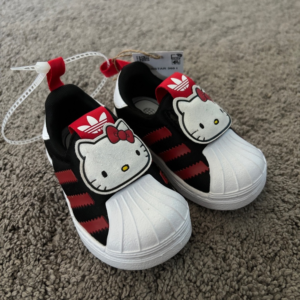 Kids Black & White Cartoon Slip-On Sneakers with Red Accents